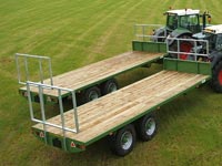 staines hay bale trailers and tractor in a field thumbnail