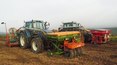 farmers ploughing the fields